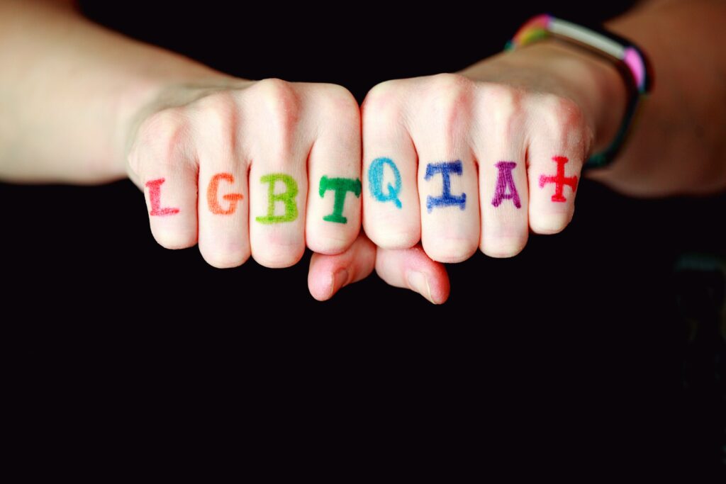 the phrase "lgbtqia+" written on fingers